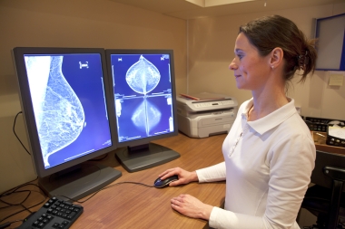 woman viewing mammogram results