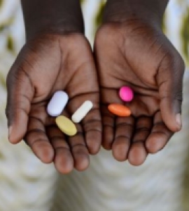 Hands holding meds	