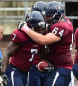 Football players huddling