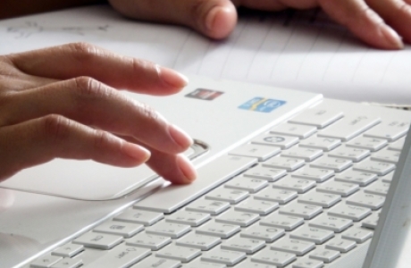 closeup of typing on computer