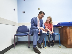 Doctor talking with child