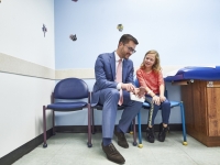 Doctor talking with child